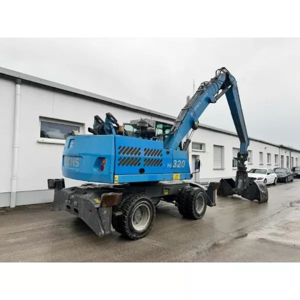 Употребяван багер за материали Terex Fuchs MHL320 D 2014