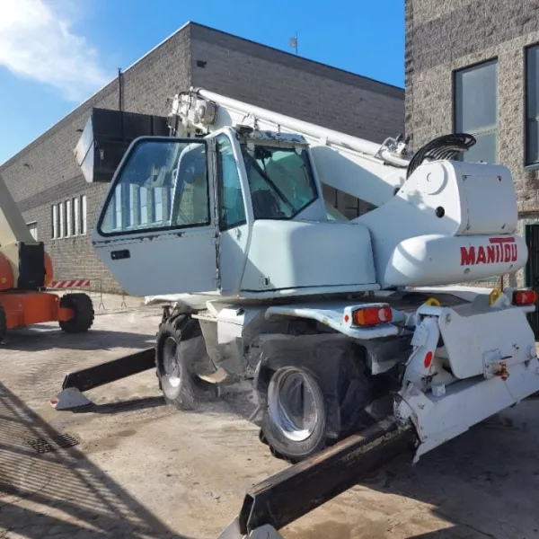 Употребяван телескопичен товарач Manitou MRT1542 2004