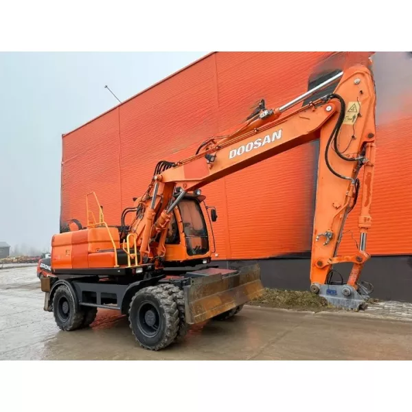 Колесен багер Doosan DX140W 2009