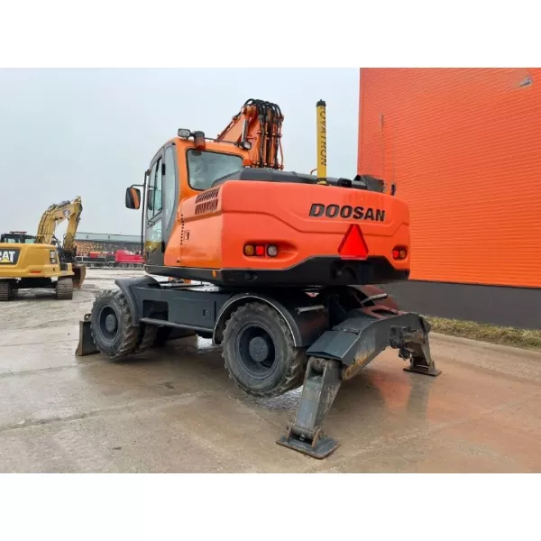 Колесен багер Doosan DX140W 2009