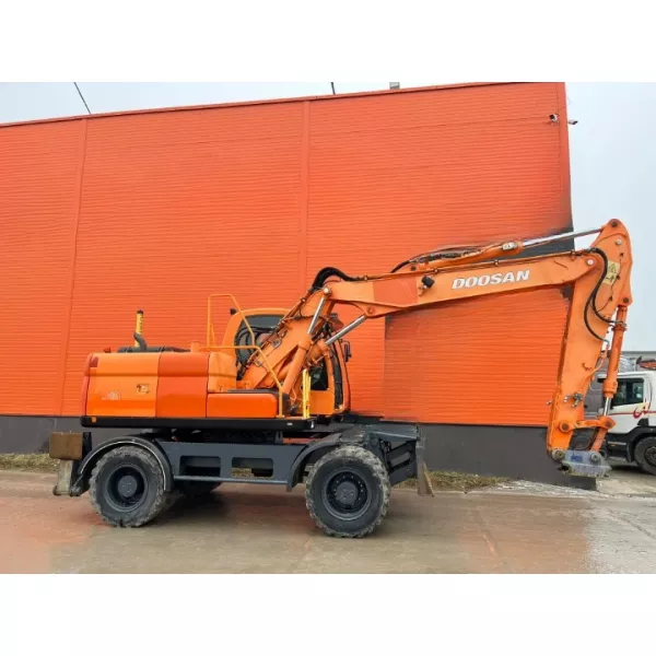 Колесен багер Doosan DX140W 2009