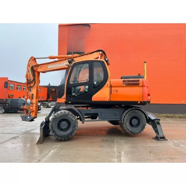 Колесен багер Doosan DX140W 2009